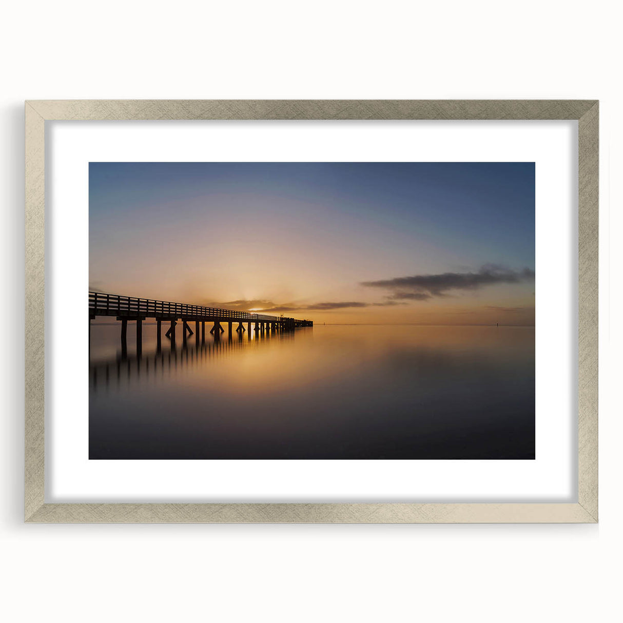 Textured abstract art print of the New Zealand West Coast in muted earth tones on a framed silver canvas.