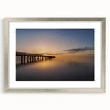 Textured abstract art print of the New Zealand West Coast in muted earth tones on a framed silver canvas.