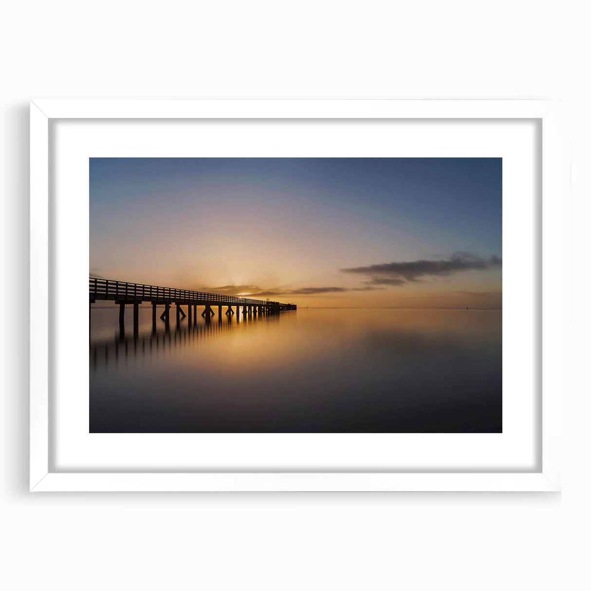 Abstract art print of New Zealand's West Coast in muted blue and green tones on a framed white canvas.