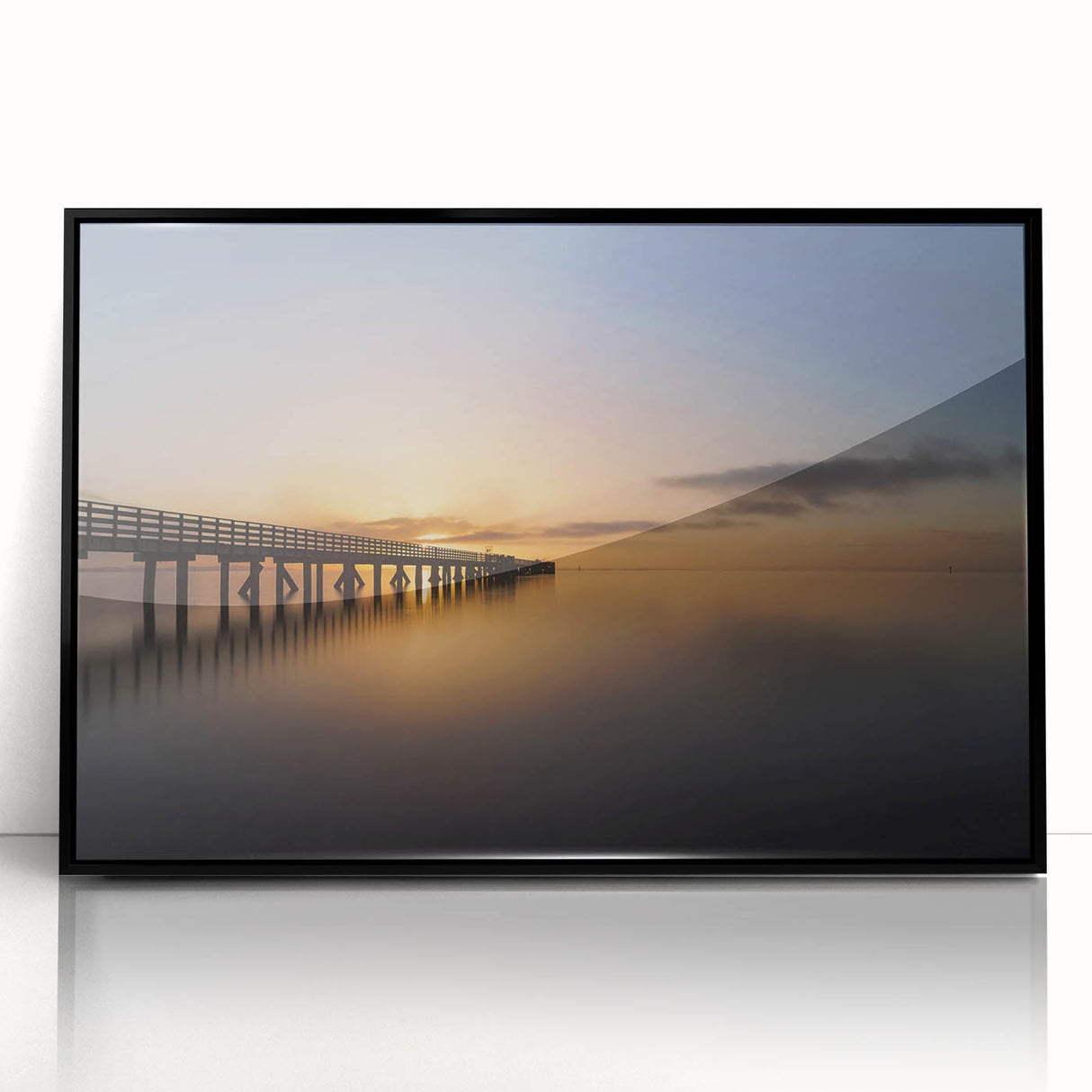 Large abstract wall art depicting New Zealand's West Coast in muted blues and greens, framed in black acrylic.