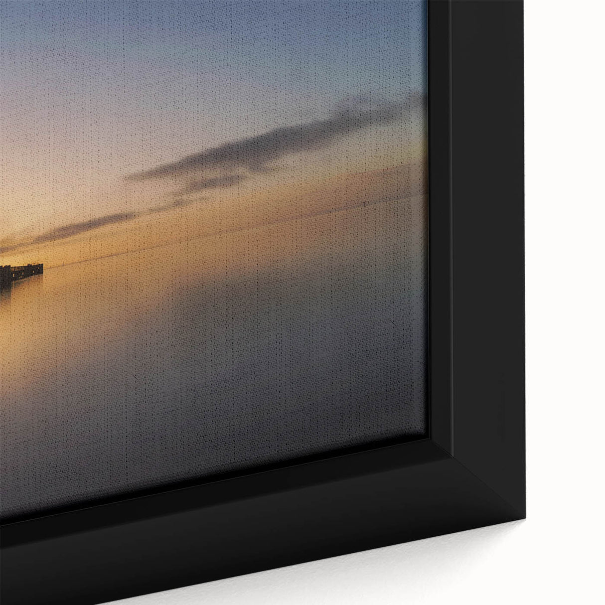 Black wall art featuring a textured view of New Zealand's West Coast on a framed canvas, ideal for living room ambiance.