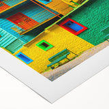 Art deco poster featuring a stylized Buenos Aires cityscape in muted pastel tones on rolled canvas.