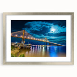 Textured abstract art print of an Argentinian landscape in muted earth tones on a framed canvas, ideal for bedroom decor.