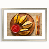 Textured abstract art print depicting a Bolivian landscape in earth tones, framed in silver, ideal for bedroom art.