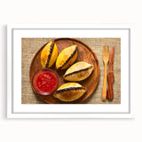 Abstract art print depicting a Bolivian landscape in muted earth tones, framed with a white mat.