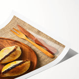 Extra large wall art featuring line art flowers in muted earth tones on a rolled canvas.