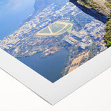 Art deco poster featuring a stylized Rio de Janeiro landscape with vibrant blues and greens on rolled canvas.