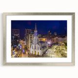 Textured abstract art print depicting a vibrant Colombian landscape in a silver frame, ideal for bedroom art.