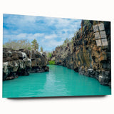 Large abstract wall art of Galapagos scenery in vibrant blues and greens on acrylic glass.