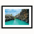 Extra large textured abstract art print of a colorful Galápagos scenery, framed in black, ideal for living room decor.