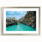 Textured art print of an abstract Galapagos landscape in muted earth tones, framed in silver, ideal for bedroom decor.