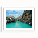 Abstract art print of Galápagos scenery in muted earth tones on a white framed canvas.