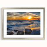 Textured abstract art print of Alabama scenery in muted earth tones on a framed silver mat, ideal for bedroom ambiance.