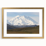 Extra large wall art featuring an abstract representation of Denali, Alaska, in textured gold and earth tones.