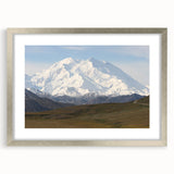 Textured abstract art print of Denali, Alaska in muted earth tones on a framed canvas, ideal for bedroom art.