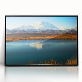 Large abstract wall art depicting Alaskan scenery in muted earth tones on a framed acrylic.