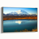 Framed canvas depicting a vintage-style Alaskan landscape in muted colorful tones.