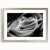 Textured art print of Antelope Canyon in Arizona, featuring warm earth tones on a silver-framed mat.