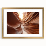 Extra large abstract art print of Coyote Buttes in Arizona, featuring textured red and orange hues on a gold-framed canvas.