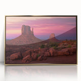 Large art print of Monument Valley with muted orange and blue tones on a framed acrylic, ideal for modern art wall decor.