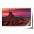 Monument Valley landscape on rolled print with earthy red and orange tones, suitable for art wall dining room.