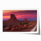 Monument Valley landscape on rolled print with earthy red and orange tones, suitable for art wall dining room.