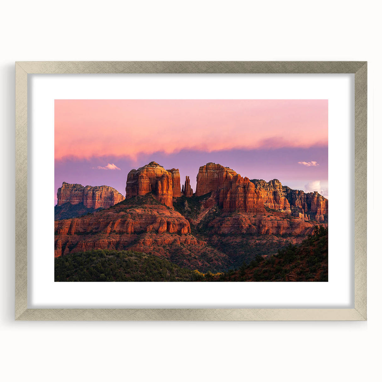Textured art print of Sedona landscape in muted earth tones on a framed silver mat, ideal for bedroom art.