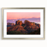 Textured art print of Sedona landscape in muted earth tones on a framed silver mat, ideal for bedroom art.
