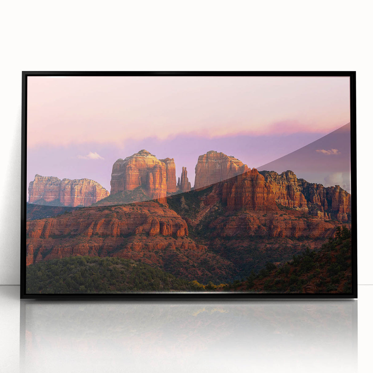 Large abstract wall art depicting Sedona's red rock formations in muted earth tones, framed in black acrylic.