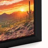 Close-up of a textured black wall art featuring a colorful Sonoran desert scene on a framed canvas.