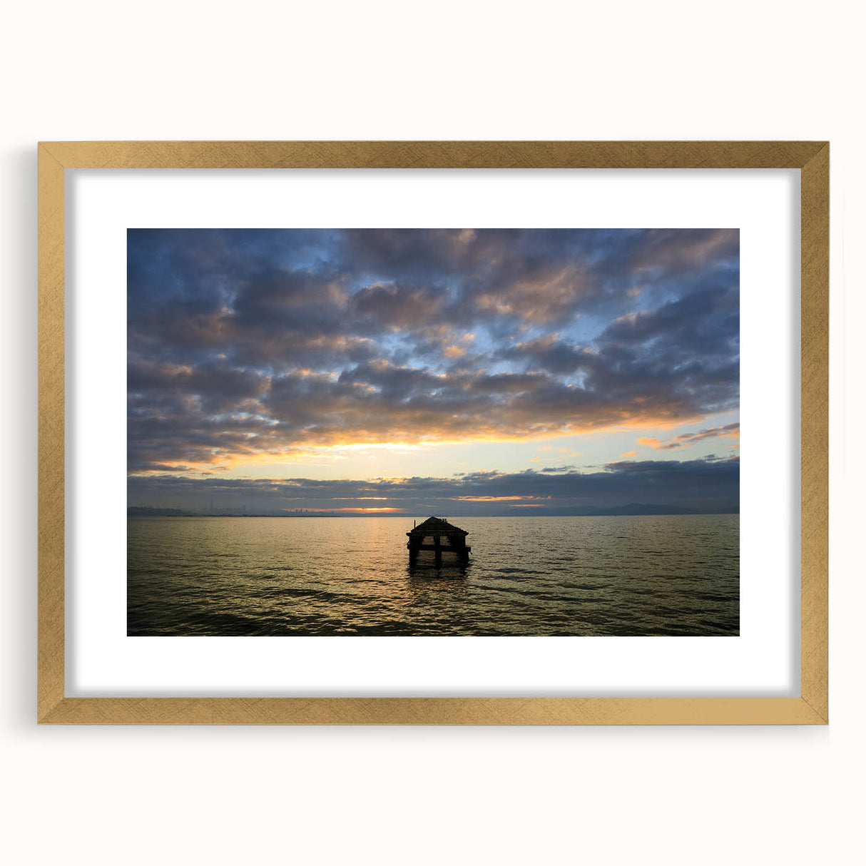 Extra large abstract art print of a textured California scenery in muted earth tones, framed in gold.