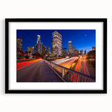 Abstract art print of colorful, textured scenery depicting Beverly Hills, in a large black frame.