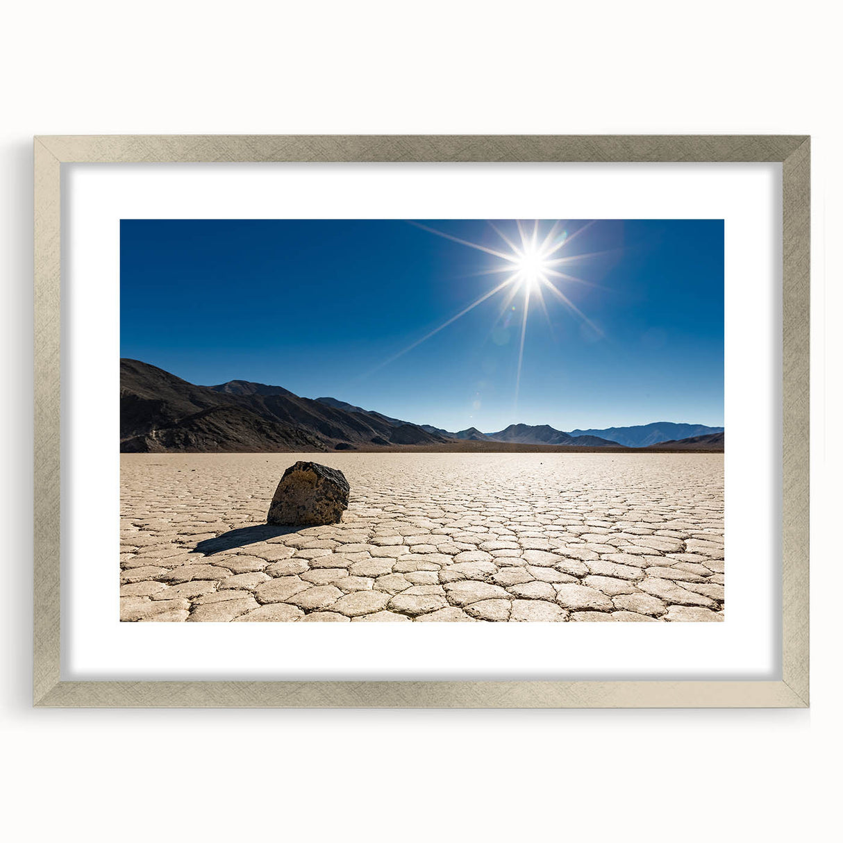 Textured art of Death Valley in muted earth tones on a framed canvas, suitable for bedroom decor.