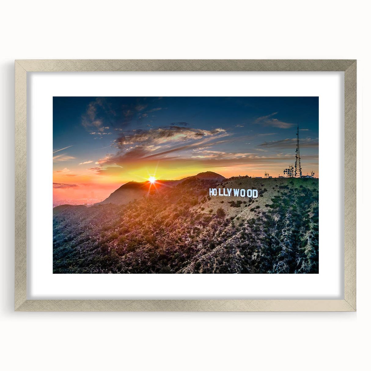 Textured abstract art print of Hollywood, California in silver frame, with muted earth tones, ideal for bedroom decor.