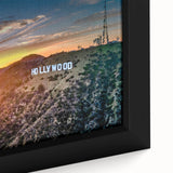 Close-up of extra large black wall art featuring a textured Hollywood, California scenery on framed canvas.