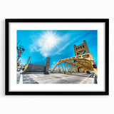 Abstract art print of colorful, textured scenery, in a black frame with mat, ideal for living room decor.