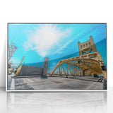 Art Deco style poster featuring the Sacramento skyline in muted grey and white tones on a framed acrylic print.