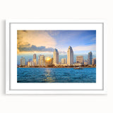 Abstract art print of San Diego skyline in muted blue tones on a white-framed canvas, ideal for dining room decor.