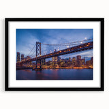 Extra large abstract art print of San Francisco in vibrant colors on textured canvas, framed in black.