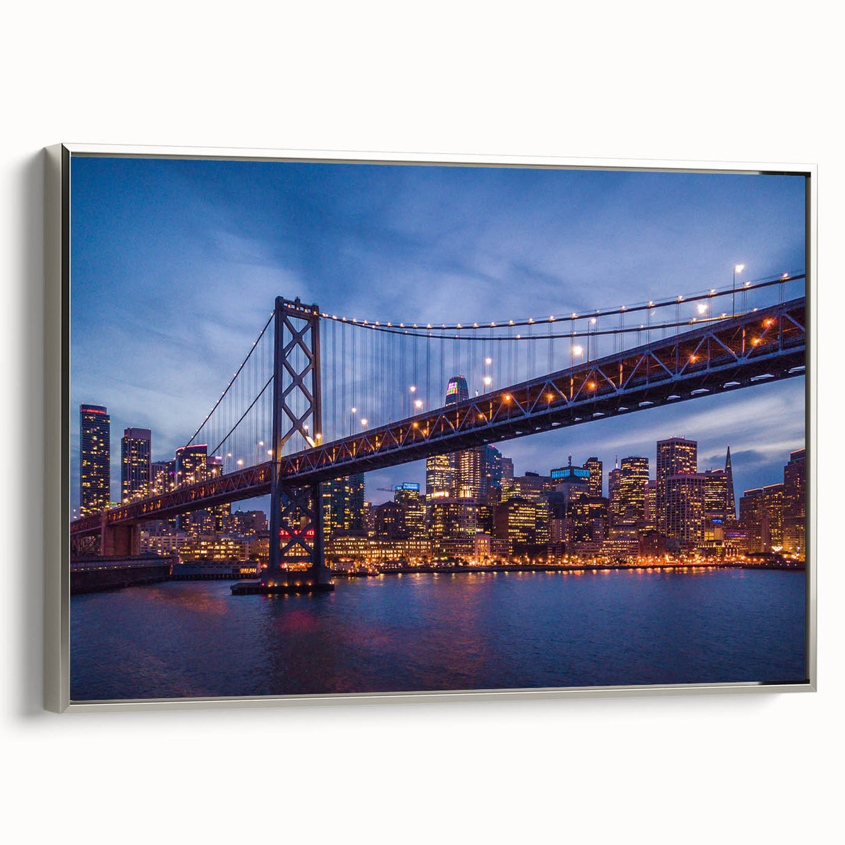 Framed canvas of San Francisco landscape art in vintage poster style, featuring colorful art on black background.