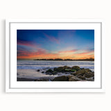 Abstract art print of Santa Barbara coastline in muted blue and gray tones on a white framed canvas.