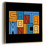 Framed canvas wall art featuring a vintage-style landscape of Santa Monica with silver and gold tones.