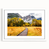 Abstract art print of Yosemite landscape in muted earth tones on a framed white mat, ideal for dining room decor.