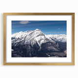 Extra large wall art depicting an abstract Colorado scenery in textured earth tones, framed in gold.