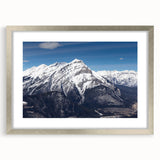 Textured art print depicting an abstract Colorado Vail scenery in muted earth tones, framed in silver.