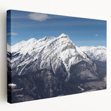 Vail, Colorado mountain landscape on large stretched canvas, featuring earthy green and blue tones.