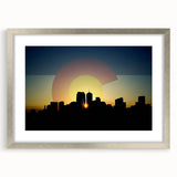 Textured abstract art print of Denver skyline in muted earth tones, framed with a silver mat, suitable for bedroom decor.