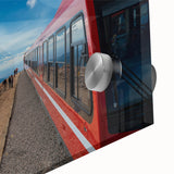 Large abstract depiction of Pikes Peak in muted earth tones on acrylic glass.