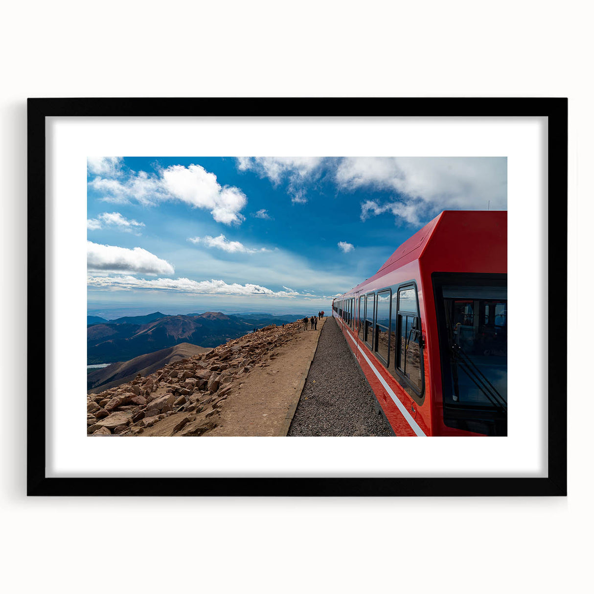 Abstract art print of Pikes Peak with textured, colorful strokes on a large framed canvas, ideal for living room decor.