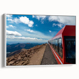 Vintage poster art of Pikes Peak in vibrant colors on a large framed canvas, suitable for living room decor.